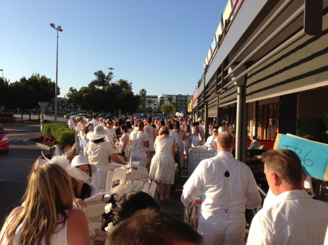 Crowds gather outside Toombul Centro ready for transportation to the 'surprise' venue. 