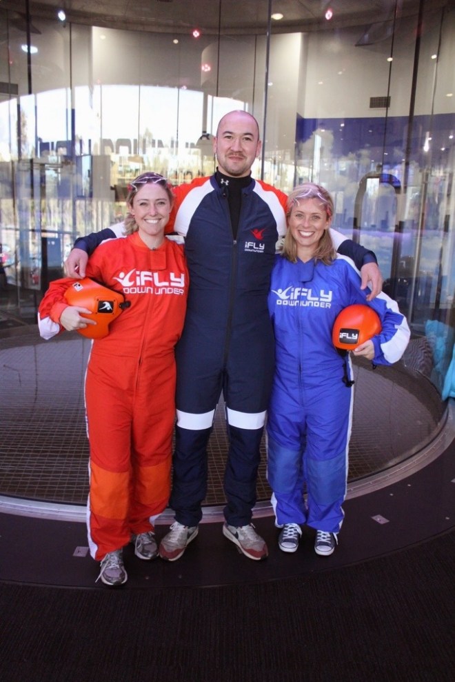 Erin, our instructor Frazer and I ... Erin and I might look like the world's tiniest astronauts but we were mad indoor skydivers (well ... kind of).